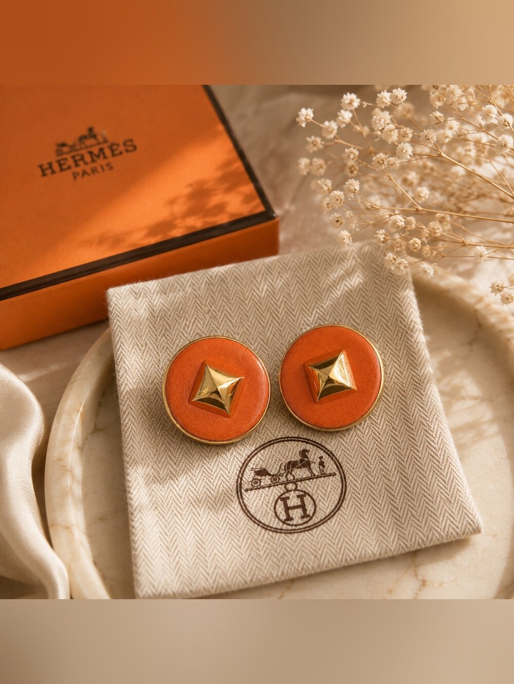Hermès Medley Gold Pyramid Studs And Orange Leather